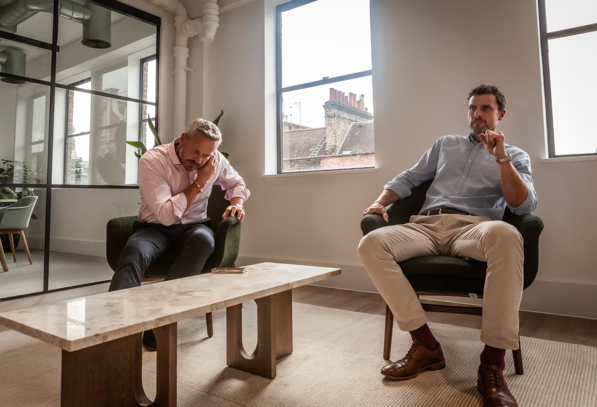 Property Investment Club — founders in discussion in a London office